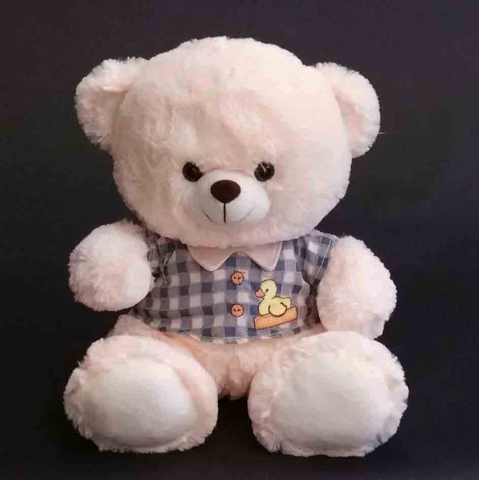 P115 - 12" Cream  Sitting Bear with Blue Shirt - 15.50 ea